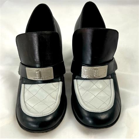 chanel loafers open|Chanel black and white loafers.